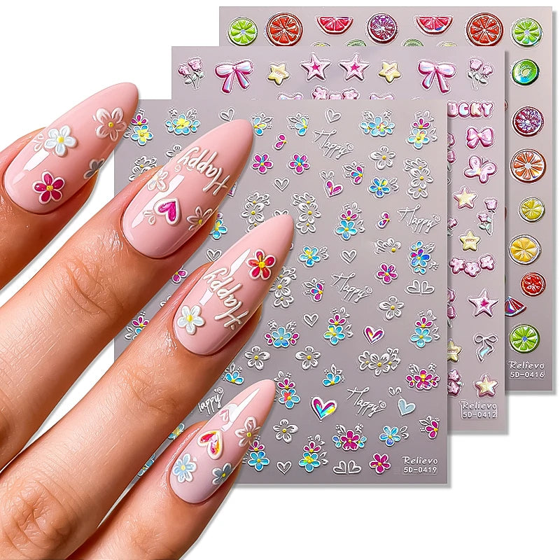 Close-up of raised 5D embossed nail decals for DIY manicure and press-on nail decoration