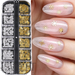 Close-up of thin snowflake charms for gel, acrylic, natural and press-on nails