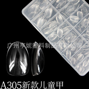 Close-up of transparent press on nail tips for kids parties and dress-up