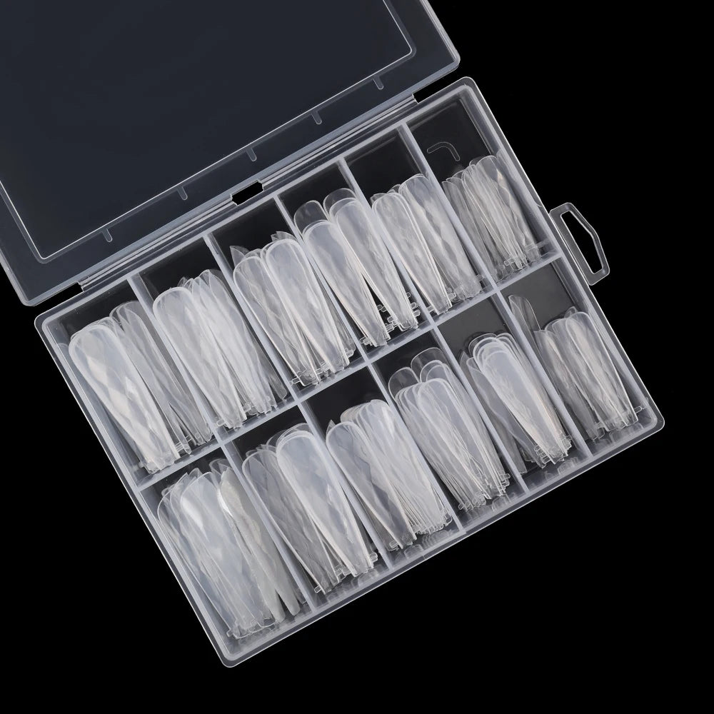 Close-up of glossy stiletto false nail tips for at-home manicure and DIY nail art