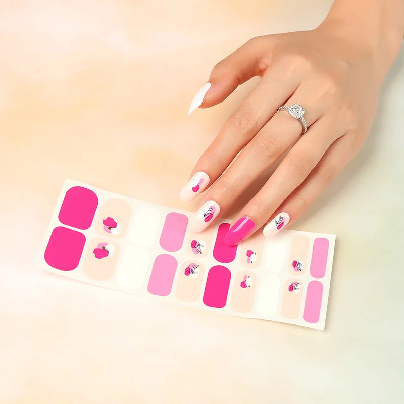 Close-up product view of glitter nail decal designs with a raised 3D-style finish