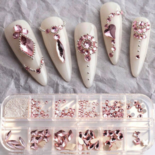 Pink nail art decorations arranged inside a 12-compartment organizer box