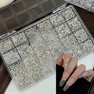 Mixed-size glass nail rhinestones organized in a 24-compartment storage case