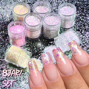 Mixed-size holographic nail sequins with chunky light-reflecting texture
