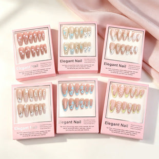 Gilded cat eye almond press-on nails with translucent jelly finish and gold-toned accents