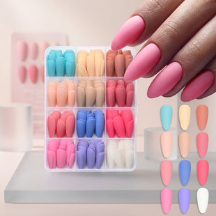 Close-up view of matte almond fake nails texture and wearable nail style