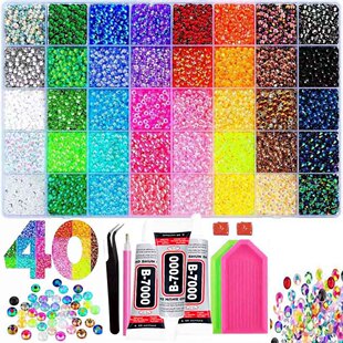 Close-up of colorful flatback resin nail gems for press-on nails, manicures, and DIY phone case decoration