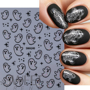 Close-up detail of Halloween themed nail sticker sheet with ghost and spider web designs