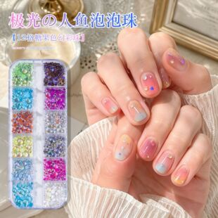 Close-up of iridescent mermaid pearl nail decorations for gel, acrylic, and press-on nail art
