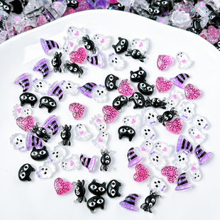 Mixed Halloween nail charms with cartoon cat, eye, and spooky designs