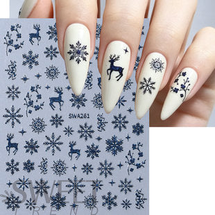 Christmas nail stickers with white snowflakes, reindeer and Christmas tree winter nail art decals