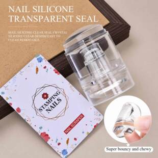 Transparent nail stamper close-up showing reusable silicone head