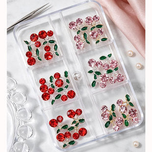 24-piece set of pink and red 3D cherry nail charms with rhinestone accents