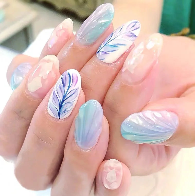 TPO- and HEMA-free seashell glitter gel nail polish with luminous ocean-inspired shimmer