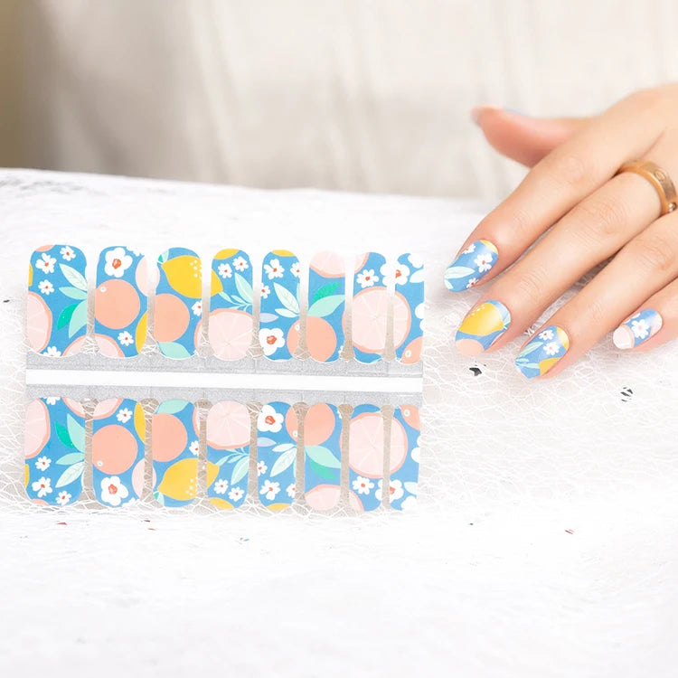 Close-up of glitter nail art stickers for quick at-home manicure looks